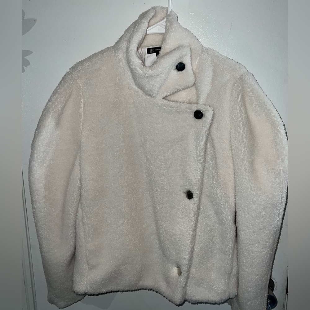 White furry jacket
